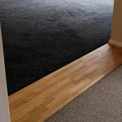 Staved Oak Threshold and Graphite Carpet